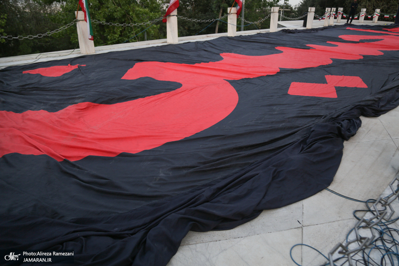مراسم اهتزاز بزرگترين پرچم عزاداری در تهران