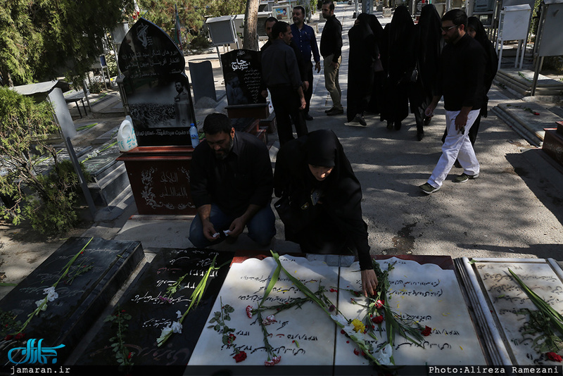 غبارروبی و عطرافشانی قبور مطهر شهدا 