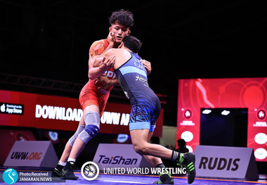 ظهور دومین کشتی گیر ایرانی- ژاپنی؛ آریا یوشیدا نایب قهرمان آسیا شد!+عکس