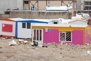 داستان مردی که رنگ را به خانه های زلزله زده های کرمانشاهی می آورد