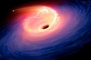 سیاهچاله‌ غول‌پیکر در حال بلعیدن یک ستاره